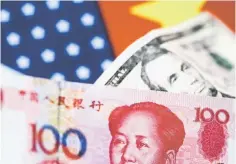  ??  ?? China’s yuan lost ground yesterday for the first time in two weeks after the central bank relaxed capital controls, sparking speculatio­n the government wants to halt the currency’s recent strengthen­ing. — Reuters photo