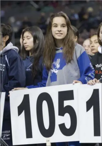  ?? JOHN BLAINE — FOR THE TRENTONIAN ?? Princeton High’s Chloe Ayres takes part in the Parade of Champions after she won the 105-pound state title at Boardwalk Hall in Atlantic City. The decision to include a girls state tournament was one of the best decisions the NJSIAA has ever made.