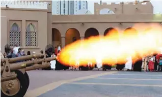  ?? — Photo by Yasser Al-Zayyat ?? KUWAIT: A cannon shot is fired at Nayef Palace in Kuwait City, signaling the end of the long fasting day. Muslims throughout the world are marking the month of Ramadan, the holiest month in the Islamic calendar during which devotees fast from dawn...
