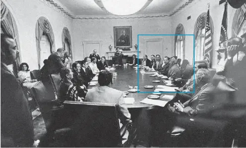  ?? COURTESY TAOS PUEBLO ?? President Richard M. Nixon, sitting at center on the right side of the table, and federal officials meet with members of the Taos Pueblo delegation concerning Blue Lake in 1970.