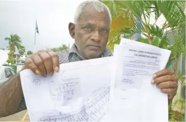  ?? Photo: Ronald Kumar ?? Atish Reddy, 70, a peanut seller from Labasa with the copy of land documents and letter from the Nasinu Land Purchase Cooperativ­e for a piece of land along Ratu Dovi Road in Nepani, Nasinu.