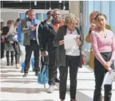  ?? WAYNE PARRY/AP ?? Applicants line up at a job fair at the Ocean Casino Resort in Atlantic City, N.J., last Monday.