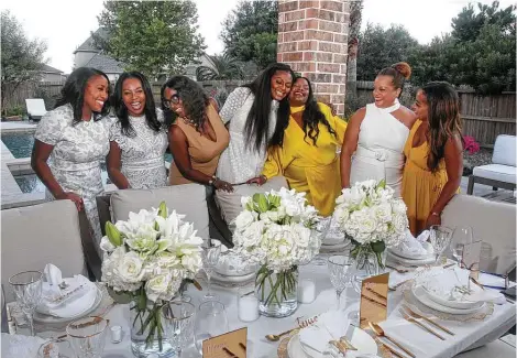  ?? Photos by Gary Fountain / Contributo­r ?? Members of the Eight Seats Garden Club include Queenie Wilkins, from left, Angela Hudson, Nicole Walters, Ebony Goudeau, Tejuana Edmond, Tanya Easter and LaTonya Wright.