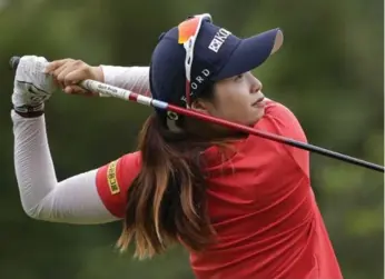  ?? SETH WENIG/THE ASSOCIATED PRESS ?? Hye Jin Choi, a 17-year-old amateur from South Korea, was tied for second at the U.S. Women’s Open on Friday, two shots behind leader Shanshan Feng of China. Canadian Brooke Henderson was tied for 10th, five off the lead.