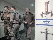  ?? DAN BALILTY/THE ASSOCIATED PRESS FILE ?? The Israeli Christians Recruitmen­t Forum Associatio­n claims to have recruited 100 to 150 volunteers to join the Israeli army.