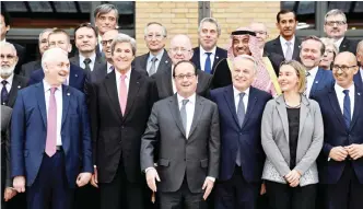  ??  ?? PARIS: (From left) Russian Ambassador to France Alexander Orlov, US Secretary of State John Kerry, French President Francois Hollande, French Foreign Minister Jean-Marc Ayrault, European Union Foreign Policy Chief Federica Mogherini and French State...