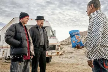  ?? ?? BREAKING AD: Aaron Paul, Bryan Cranston and Raymond Cruz flog snack PopCorners.