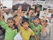  ?? GETTY ?? Children shout pro-azadi slogans at a demonstrat­ion in Srinagar.