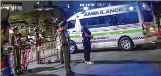  ?? LINH PHAM / GETTY IMAGES ?? The last rescued schoolboys and their coach arrive at a hospital on Tuesday in Chiang Rai, Thailand. The boys, aged 11 to 16, and their 25-year-old coach are in good health.