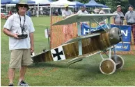  ??  ?? Getting ready for the WW I Gaggle, here is Scott Vickery and his impressive half-scale ZDZ 250cc-powered Fokker Dr.I Triplane.