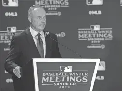  ??  ?? MLB Commission­er Rob Manfred, seen Dec. 10, says there is a “100%” chance of big league ball this year.