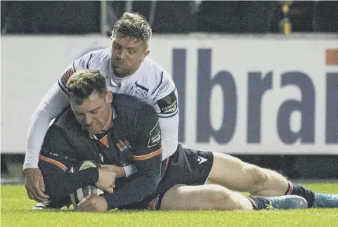  ??  ?? 0 George Taylor touches down to put Edinburgh in front against Cardiff Blues at BT Murrayfiel­d last night.