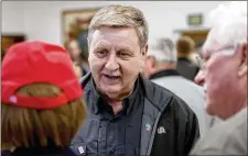  ?? AP ?? LEFT: Conor Lamb, the Democratic congressio­nal candidate in Pennsylvan­ia’s 18th District, greets supporters after speaking to the United Mine Workers of America on Sunday. GETTY IMAGES RIGHT: Republican Rick Saccone talks with supporters at a campaign...