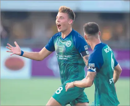  ?? BRAD HORRIGAN/HARTFORD COURANT ?? Hartford Athletic midfielder Mads Jorgensen, left, celebrates his first half equalizer against Philadelph­ia Union II at Dillon Stadium Saturday night.