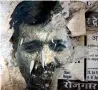  ?? AP ?? A torn poster of Arvind Kejriwal is seen on a wall of a residentia­l colony in New Delhi. —