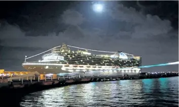  ?? BARB FOX/SPECIAL TO POSTMEDIA NEWS ?? The Caribbean Princess under a full moon in better days in port at San Juan.