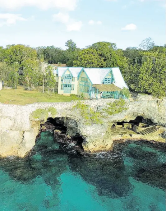  ?? ?? One of Jamaica’s most unusual homes, fearlessly built directly on top of two sea cave.