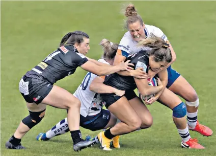 ?? ?? Global occasion: American internatio­nal Gabby Cantorna attempts to shake off two Bristol opponents for Exeter at Sandy Park