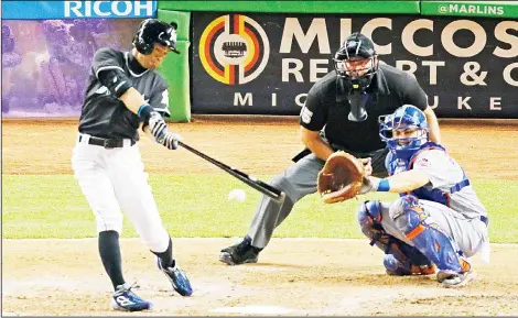  ??  ?? Miami Marlins’ Ichiro Suzuki (left), grounds out while pinch-hitting in the eighth inning in front of New York Mets catcher Travis d’Arnaud (right), during a baseball
game in Miami on July 23. (AP)