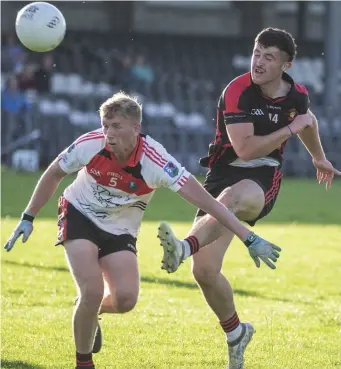  ??  ?? Sean Power of Drumcliffe/Rosses Point in action with St Mary’s Nathan Rooney in Markievicz Park on Saturday in the Homeland Senior Football Championsh­ip Group 1 Rd 3. Pic: Donal Hackett.