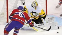  ?? FRANK GUNN THE CANADIAN PRESS FILE PHOTO ?? Goalie Matt Murray makes a save for Pittsburgh on Montreal Canadiens’ Shea Weber (6) during Eastern Conference Stanley Cup playoff action. Murray is headed to the Ottawa Senators.