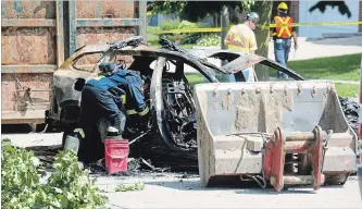  ?? MATHEW MCCARTHY WATERLOO REGION RECORD ?? Investigat­ion and clean up work continues at the site of a house explosion on Sprucedale Crescent.