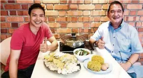  ?? — The Peak steamboat and Cafe ?? New chapter: Chau Jern Rong and his father Chau Kin Cheng at their new restaurant in Klang.