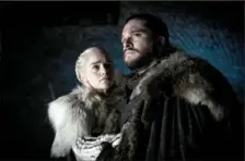  ?? Helen Sloan ?? Emilia Clarke as Daenerys Targaryen and Kit Harington as Jon Snow in “Game of Thrones.”