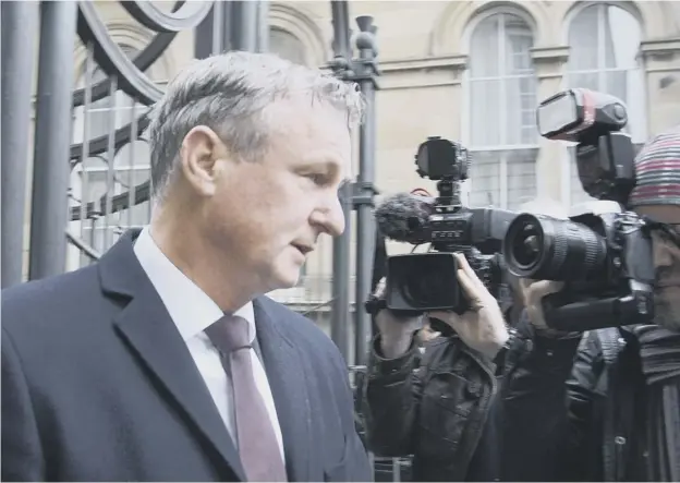  ?? PICTURE; ALISTAIR LINFORD ?? 0 Michael O’neill leaves court yesterday. He was just under three times the legal drink- driving limit when he was caught in Edinburgh