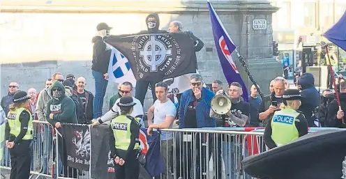  ?? Photograph: Ailean Beaton ?? Demonstrat­ors from the far-right National Front and White Brotherhoo­d Scotland groups