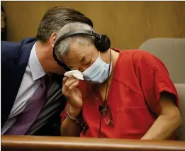  ?? DAI SUGANO — BAY AREA NEWS GROUP VIA AP ?? Chunli Zhao wipes a tear during a hearing at the San Mateo County Hall of Justice in Redwood City Friday. A San Mateo County judge heard arguments regarding a gag order in the criminal case of Zhao, a farmworker accused of killing seven people in back-toback shootings at two Northern California mushroom farms in January.
