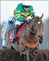  ??  ?? RACING CERT: Defi Du Seuil, on the way to his win yesterday, is now Champion Chase favourite