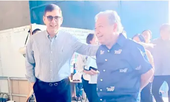  ?? PHOTOGRAPH COURTESY OF DOTR ?? TRANSPORTA­TION Secretary Jaime Bautista (right) gives Finance Secretary Ralph Recto a tour of the ongoing constructi­on of the P488.5-billion Metro Manila Subway Project at the Valenzuela depot. Recto reaffirmed the Department of Finance’s commitment to securing funding for the third tranche of the project this March. Bautista reveals an overall project implementa­tion progress rate at 40 percent as of January 2024.