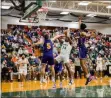  ?? SHANE PABON — FOR THE MORNING JOURNAL ?? Lorain’s Seth Wilson shoots against Lakewood on March 7 at Elyria Catholic.