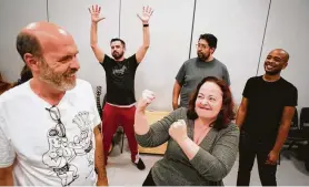  ??  ?? Longtime collaborat­ors Jason Nodler, left, and Tamarie Cooper joke with each other during a Catastroph­ic Theatre rehearsal. One of the play’s characters is a boxer named Joe.