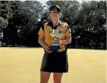  ??  ?? Victoria’s Nicole Toomey, who beat Elmwood Park’s Mandy Boyd in the women’s singles final, with her trophy.