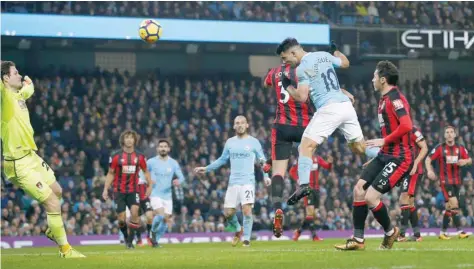  ?? — Reuters ?? Manchester City’s Sergio Aguero scores their third goal.