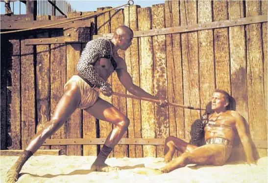 ?? UNIVERSAL PICTURES PHOTOS ?? Woody Strode and Kirk Douglas in “Spartacus,” returning in a newly restored 70MM print to the Music Box Theatre’s 70MM Film Festival in June 2022.