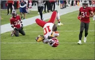  ?? DOUG MURRAY — THE ASSOCIATED PRESS FILE ?? Chiefs wide receiver Tyreek Hill does a back flip into the end zone to score a touchdown against the Buccaneers during a November game in Tampa, Fla.