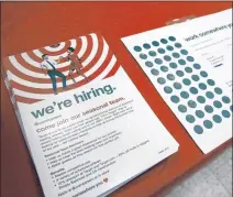  ?? NAM Y. HUH / ASSOCIATED PRESS ?? At a Target store in Chicago last month, patrons could pick up informatio­n on available jobs with the company. Likely because of two hurricanes, hiring in all jobs across the U.S. fell in September to their lowest level in five months.