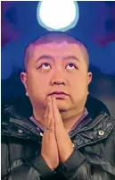  ?? AP ?? Aman prays during Christmas Eve Mass at a Catholic church in Beijing.—