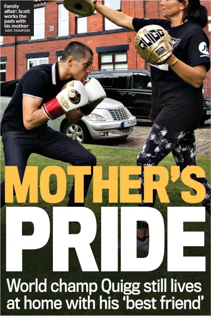  ?? DAVE THOMPSON ?? Family affair: Scott works the pads with his mother