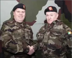  ??  ?? A handshake from Comdt Enda McDonald for Sgt Frank Murphy.