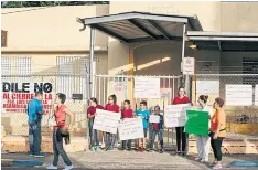  ??  ?? RIGHT TO LEARN: Parents, teachers and students protest outside Luis Santaella School in Aguas Buenas, Puerto Rico, one of 179 schools across the island set to close this week.