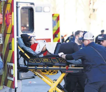  ?? ?? A person is loaded onto an ambulance following a shooting at Union Station during the Kansas City Chiefs Super Bowl LVIII victory parade, Kansas City, U.S., Feb. 14, 2024.