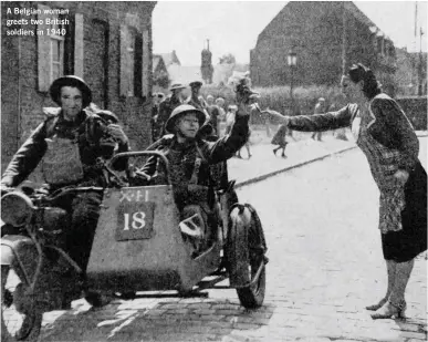  ??  ?? A Belgian woman greets two British soldiers in 1940