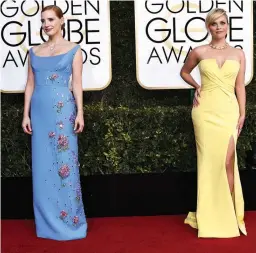  ??  ?? Jessica Chastain, left, and Reese Witherspoo­n