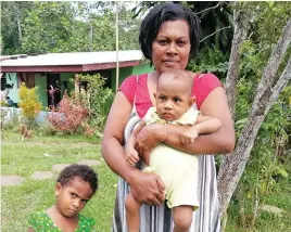  ?? Village. Photo: Mereleki Nai ?? Akanisi Labailasi and their two children, Vivuke and Kusi Labailasi at Biausevu