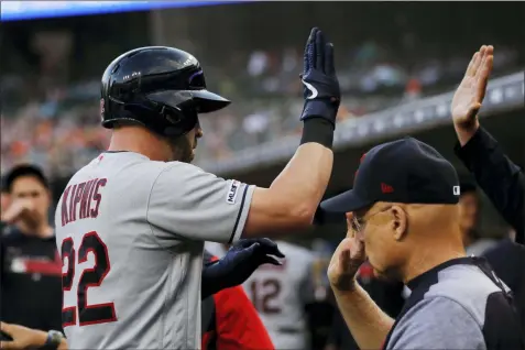  ?? CARLOS OSORIO — THE ASSOCIATED PRESS ?? Jason Kipnis is greeted in the dugout after a solo home run during the second inning Aug. 28 in Detroit.