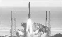  ?? JOE BURBANK/ORLANDO SENTINEL FILE ?? The Alliance Atlas 5 rocket carrying the Mars 2020 rover lifts off from Launch Complex 41 July 30 at Cape Canaveral Air Force Station. See Mission to Mars event, Sept. 24.